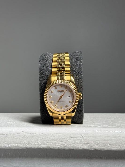 Womens Gold and White Date